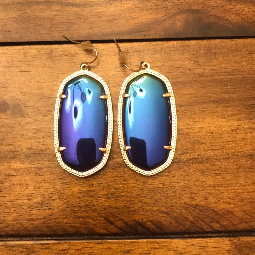 Mirrored multicolored Kendra Scott earrings.